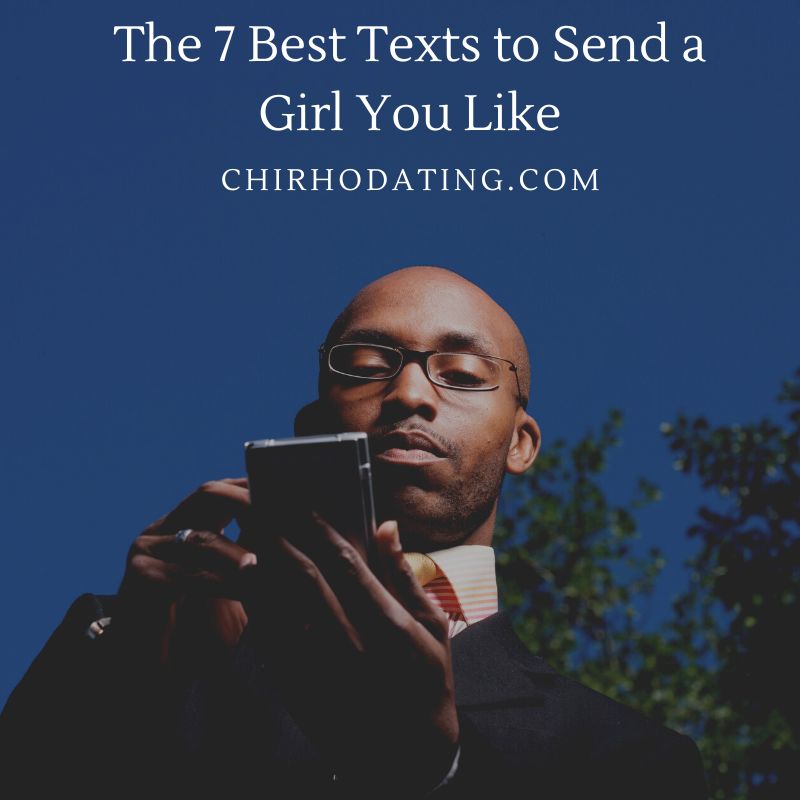black man texting a woman outdoors